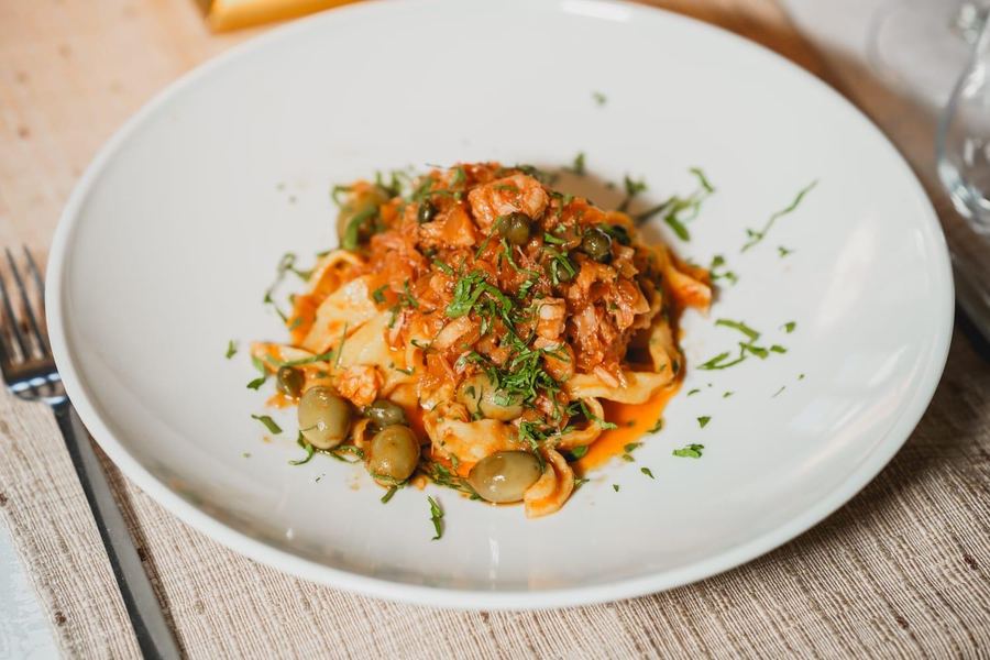 Handmade pasta with tuna, olives and capers at Monaco
